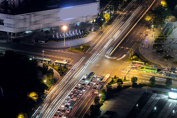 istock traffic through modern city at night 536555071