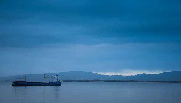 cargo boat alone with no cargo cargo boat alone with no cargo ushuaia argentina beagle channel photos stock pictures, royalty-free photos & images