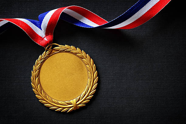 . gold medal Gold medal on black with blank face for text, concept for winning or success badge photos stock pictures, royalty-free photos & images