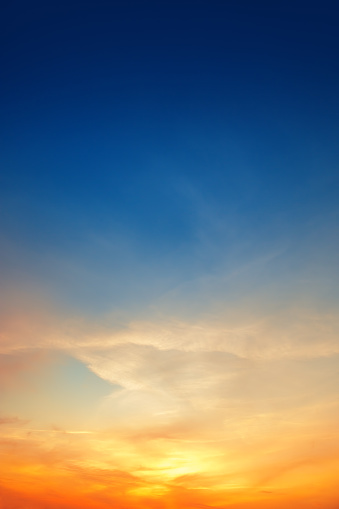 Beautiful sunset. Orange clouds in the sky. Horizon. Twilight