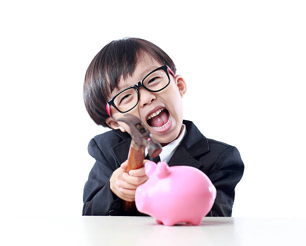istock Cute child with piggy bank 536565048