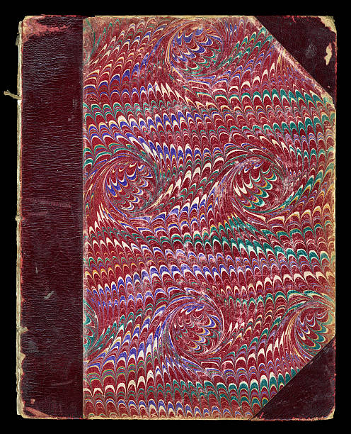 Old marbled book cover with scuffed red corners and spine
