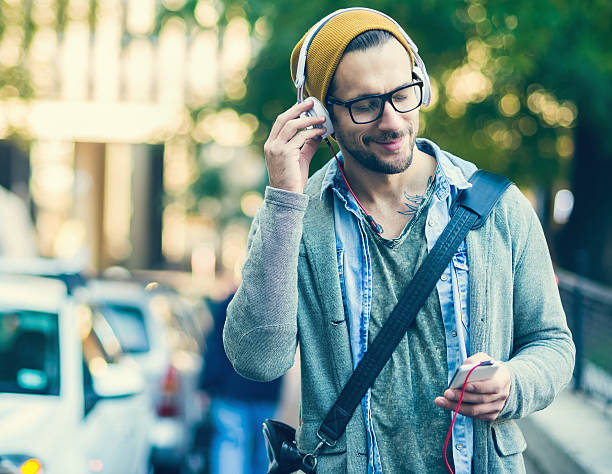 istock handsome man enjoying and listening to music 536610395