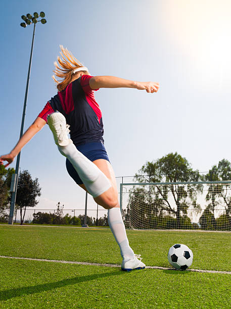 istock Soccer Women Kicking 536610423