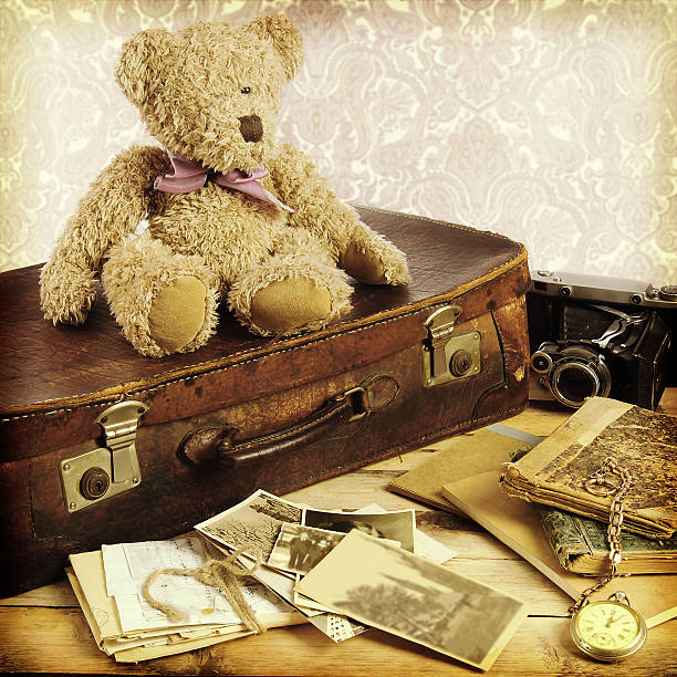 istock old suitcase, books, photos in retro style 536611573