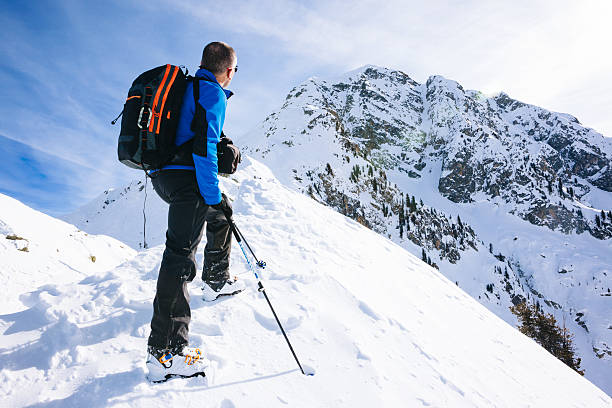 istock Winter vacation mountaineer takes a rest 536612967