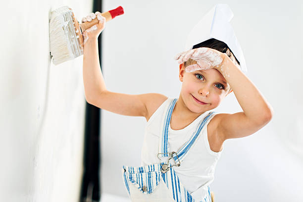 istock Little boy painting his room 536613485