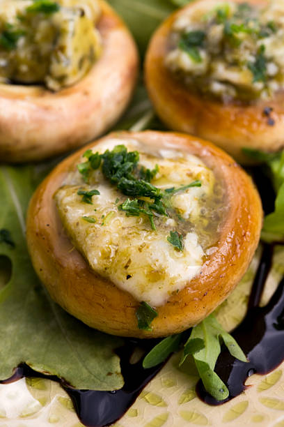 istock Delicious stuffed mushrooms with cheese and pesto 536614101