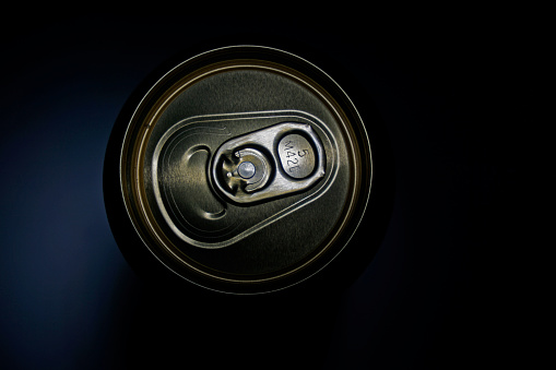 can of beer on a dark background 