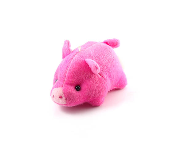 istock cute pink pig doll isolated on white background 536615495