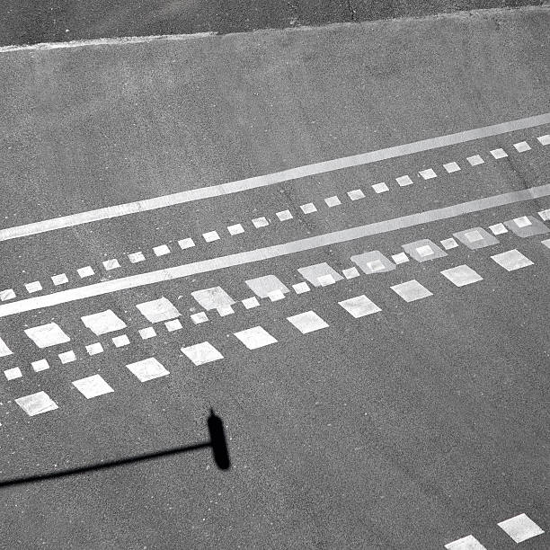 istock City asphalt lines and shadow aerial view 536615669