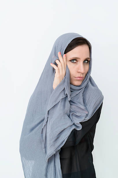 istock woman with a gray headscarf 536616645