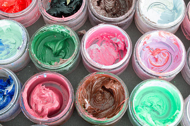 istock Oil paint in round containers background 536632676