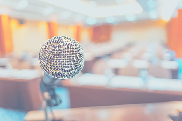 istock Blur background,close up microphone at podium at Seminar 536648994