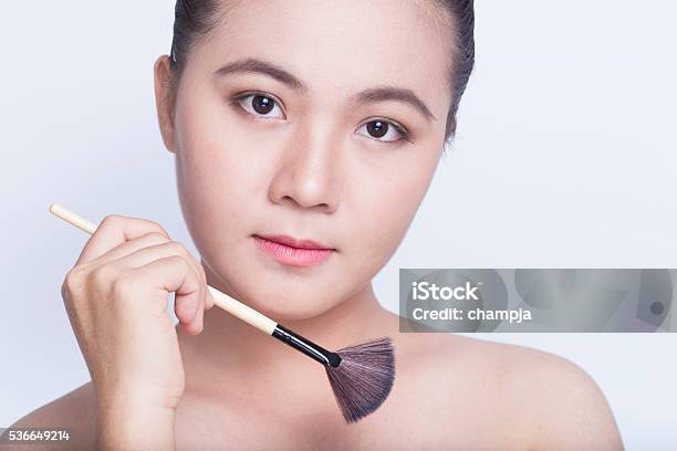 Beauty Shot Of Woman Holding The Makeup Brush Stock Photo - Download Image Now - Adult, Adults Only, Applying