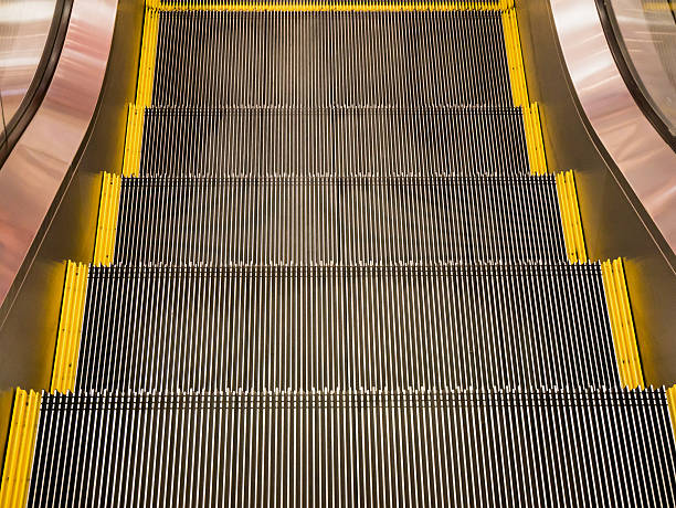 istock modern escalator in shopping center 536652760