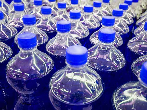istock row of carbonated soft drink bottles 536652986