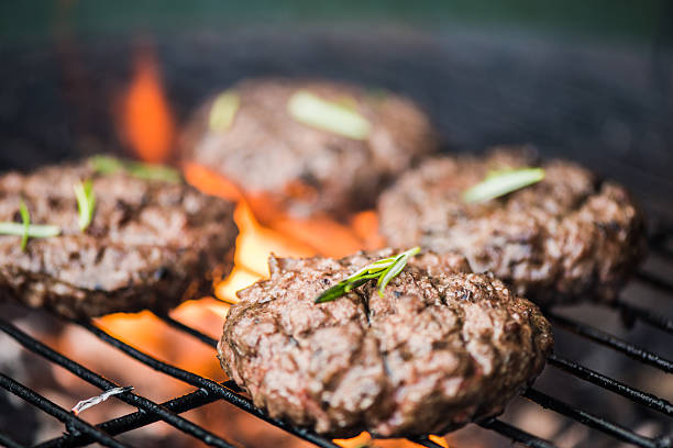 istock bbq burgers, smoke and fire 536657526