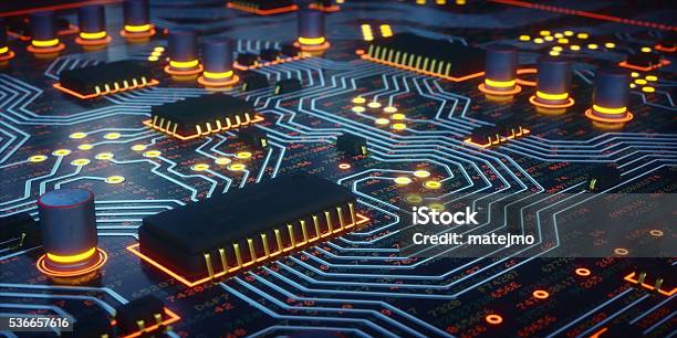 Yellow Glowing Circuit Board Closeup Stock Photo - Download Image Now - Semiconductor, Electronics Industry, Circuit Board