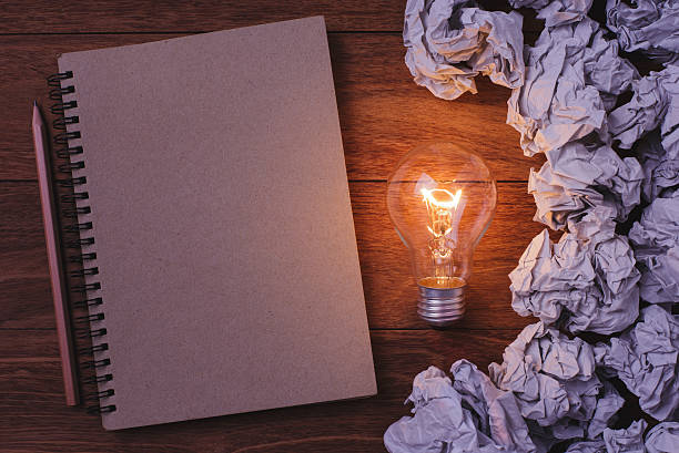 istock Paper crumpled and Light bulb. 536658494