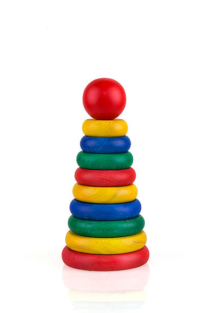 Colorful stacked round wooden circles stock photo