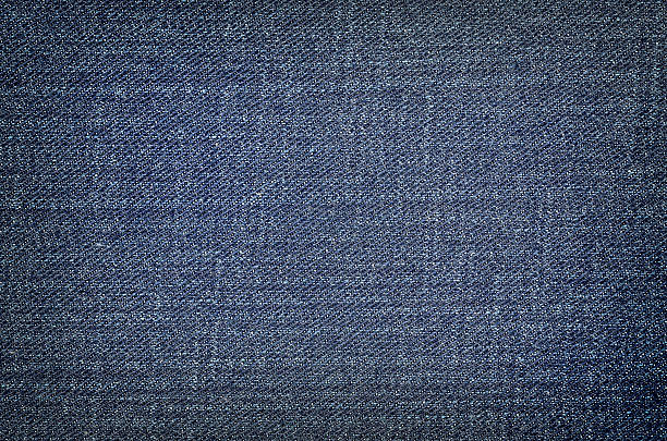 istock Texture of blue jeans textile close up 536663298