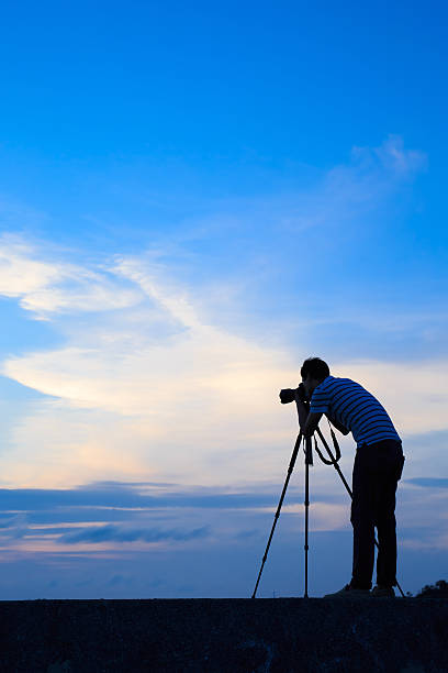 istock Silhouette of man shot camera 536666984