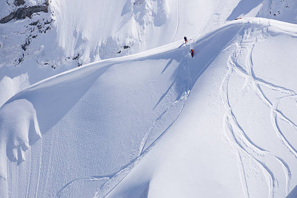 istock Snowboard freeride, snowboarders and tracks on a mountain slope. Extreme 536668082