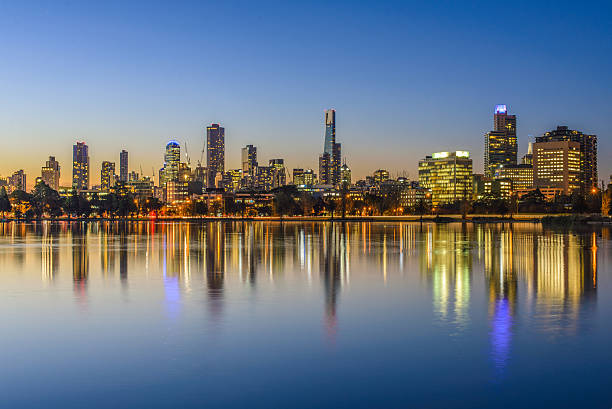 Sunset, Melbourne. This picture took at Albert Park. Capture Melbourne CBD Twilight with reflection. melbourne australia stock pictures, royalty-free photos & images