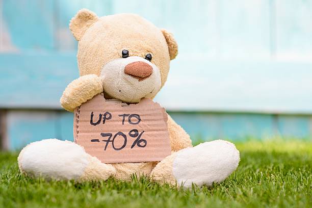 istock Teddy bear holding cardboard with information -70% 536668772