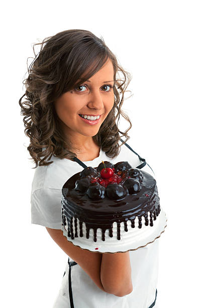 istock Young beautiful woman holding chocolate cake 536669880