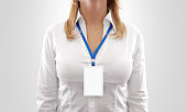 Woman wear blank white vertical badge mockup, stand isolated.