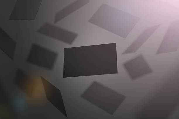 istock Blank black business cards falling 536670174
