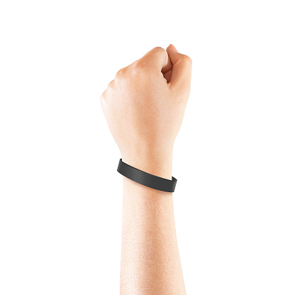 Blank black rubber wristband mockup on hand, isolated. Clear sweat band mock up design. Sport sweatband template wear on wrist arm.  Silicone fashion round social bracelet wear on hand. Unity band.