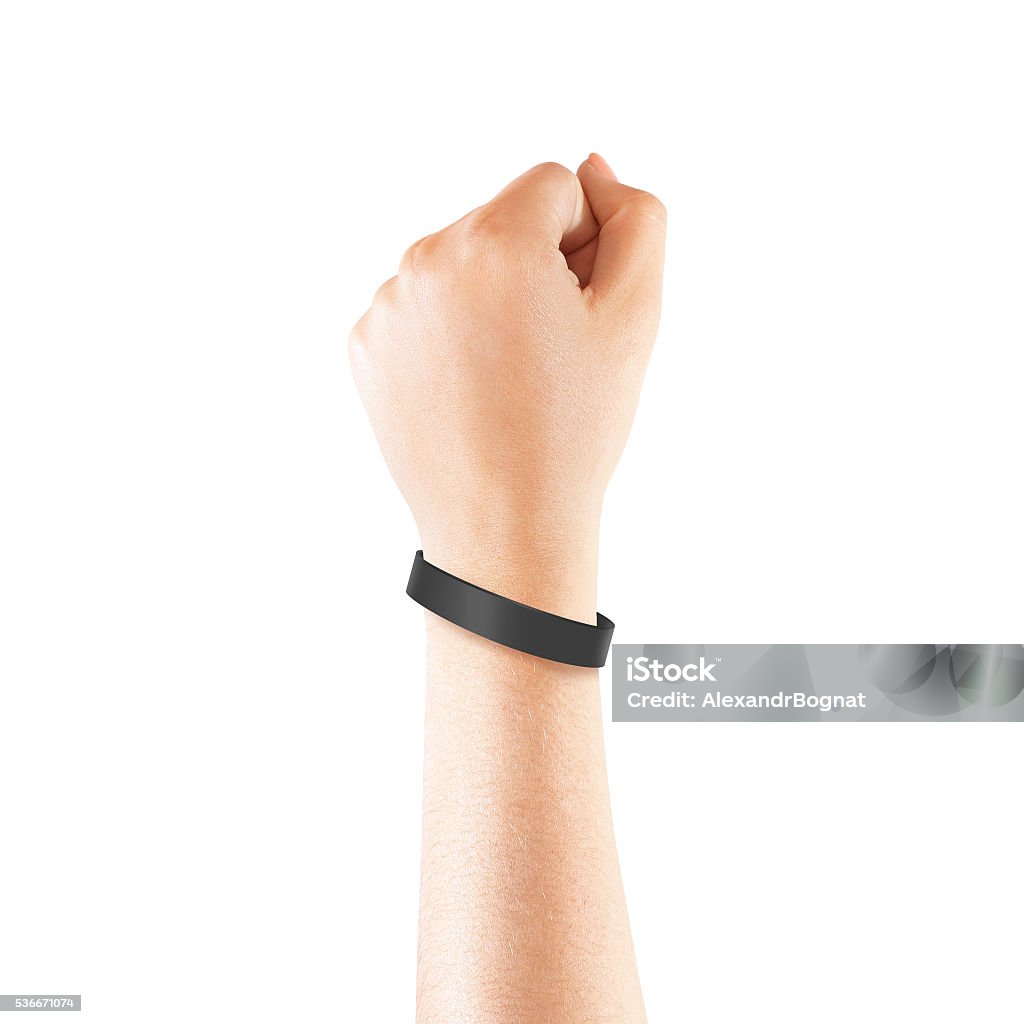 Blank black rubber wristband mockup on hand, isolated Blank black rubber wristband mockup on hand, isolated. Clear sweat band mock up design. Sport sweatband template wear on wrist arm.  Silicone fashion round social bracelet wear on hand. Unity band. Bracelet Stock Photo