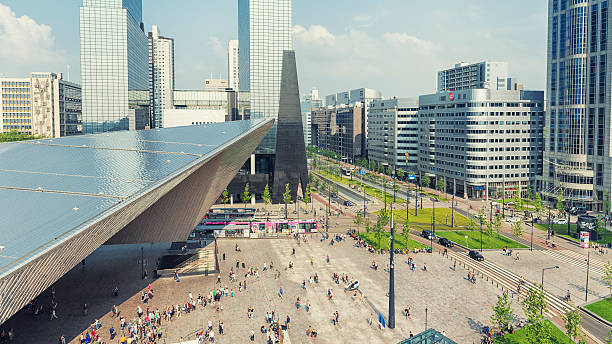 Rotterdam central station and Weena Avenue Aerial view of Rotterdam Station Square during a sunny summer day. Letterbox format used. dutch culture photos stock pictures, royalty-free photos & images