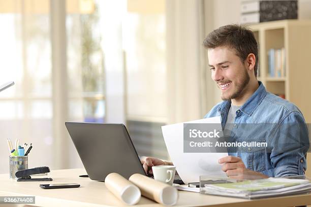 Entrepreneur Working With Laptop And Document Stock Photo - Download Image Now - Engineer, Learning, Studying