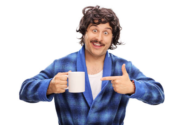 istock Man holding a cup and pointing to it 536674780