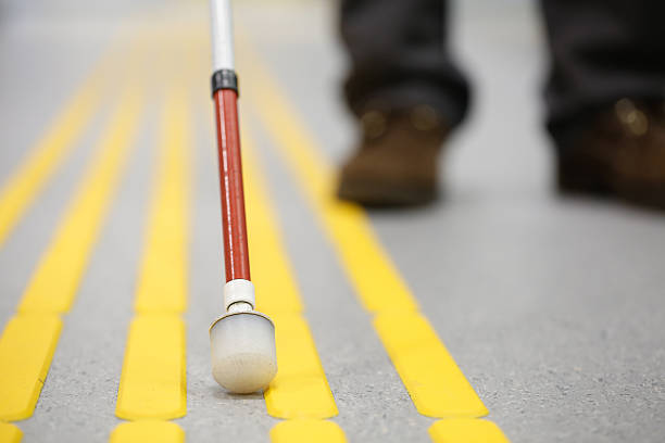 istock Blind pedestrian walking on tactile paving 536674898