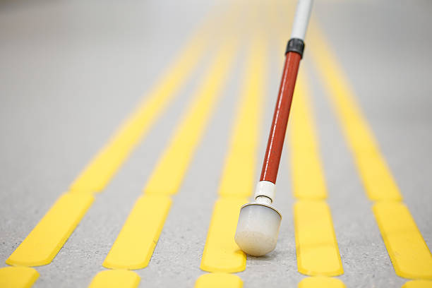 istock Blind pedestrian walking on tactile paving 536675046