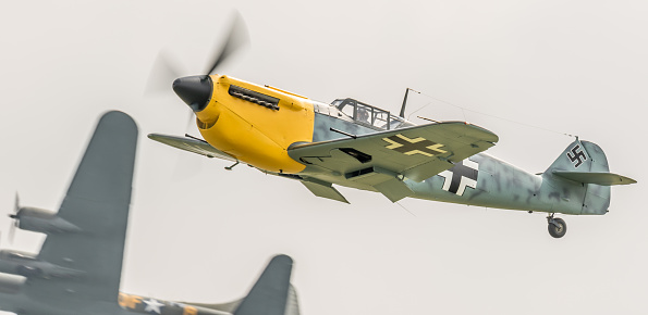 Duxford, UK - May 28, 2016: a Hispano-Suiza Buchon vintage Spanish fighter aircraft ( a development of the Messerschmitt Bf-109 WW2 German fighter aircraft ) in flight over Cambridgeshire, England. 