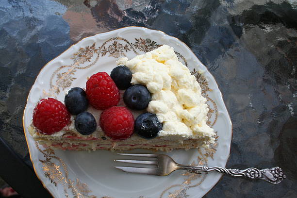 istock Piece of gateau with berries and cream 536676550