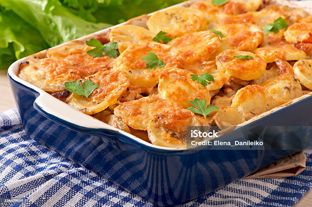 Potato casserole with meat and mushrooms with cheese crust 2015 Stock Photo