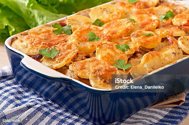 Potato Casserole With Meat And Mushrooms With Cheese Crust Stock Photo - Download Image Now