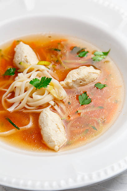 istock Chicken soup with noodles and vegetables in white bowl 536680680