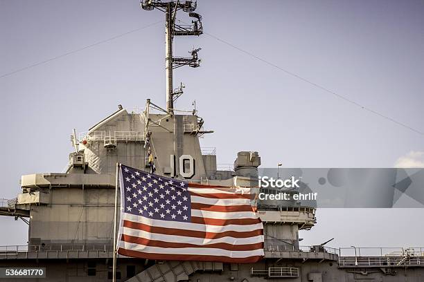 Uss Yorktown And American Flag Stock Photo - Download Image Now - US Navy, Aircraft Carrier, Navy