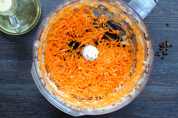 istock Chopped carrot in the food processor and olive oil 536682207