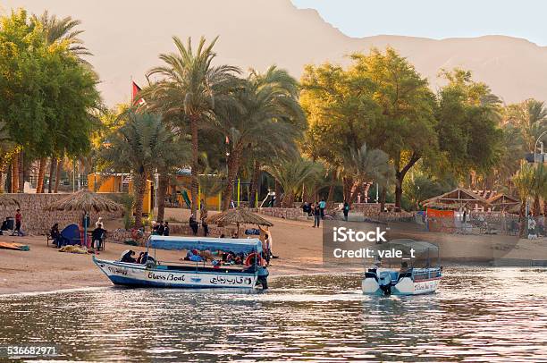 Jordanian Boatmen Waiting For Tourists Stock Photo - Download Image Now - Gulf Of Aqaba, Aqaba, Nautical Vessel