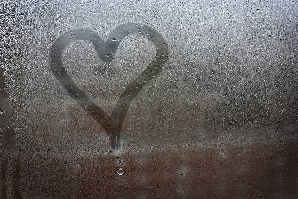 istock Heart painted on glass 536683943
