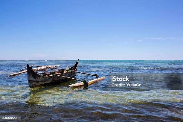 Traditional Wooden Fisherman Piroga In Madagascar Stock Photo - Download Image Now - Africa, Beach, Blue
